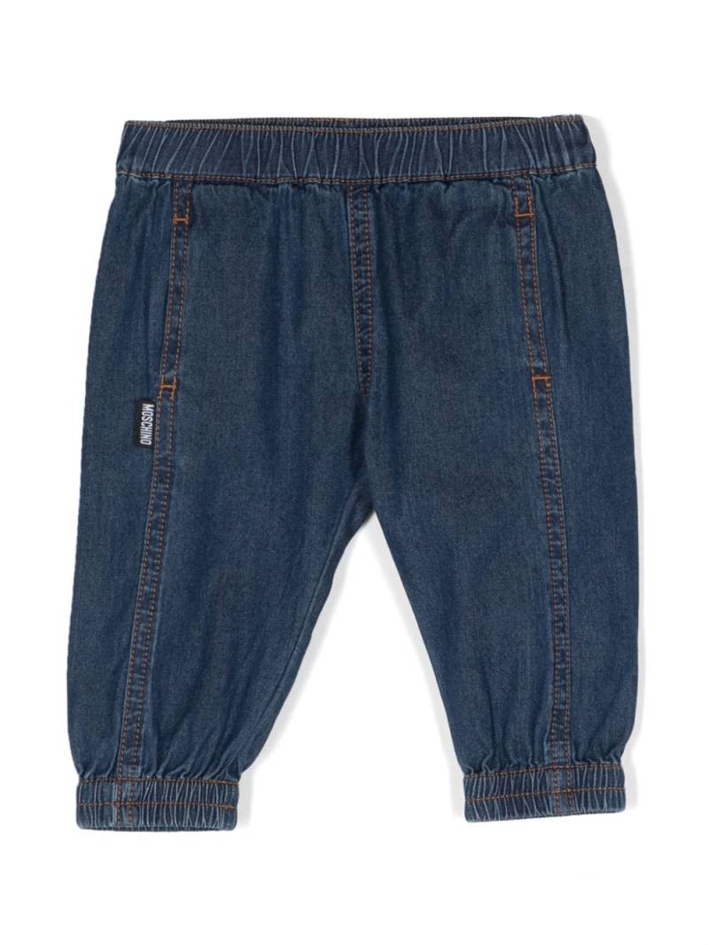 Moschino Kids seam-detail tapered jeans - Blue von Moschino Kids