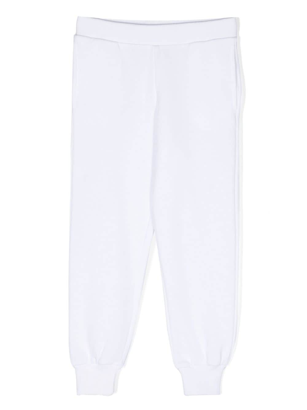 Moschino Kids slogan-print cotton track pants - White von Moschino Kids