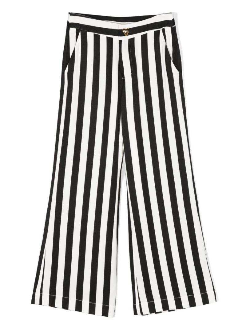 Moschino Kids striped flared trousers - White von Moschino Kids