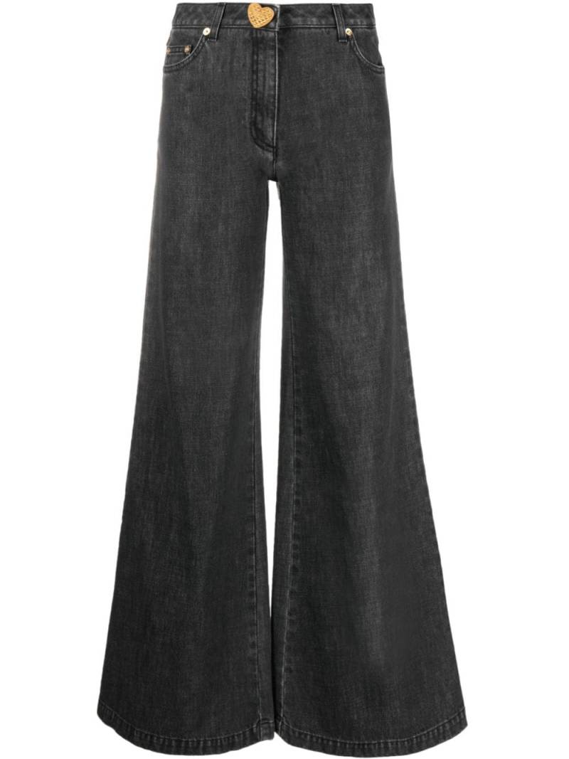 Moschino flared-design jeans - Black von Moschino
