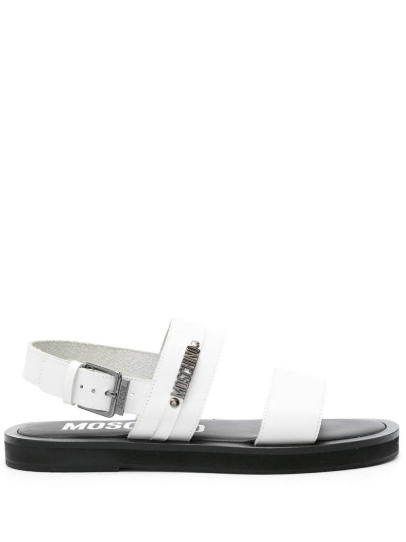 Moschino logo-appliqué sandals - White von Moschino