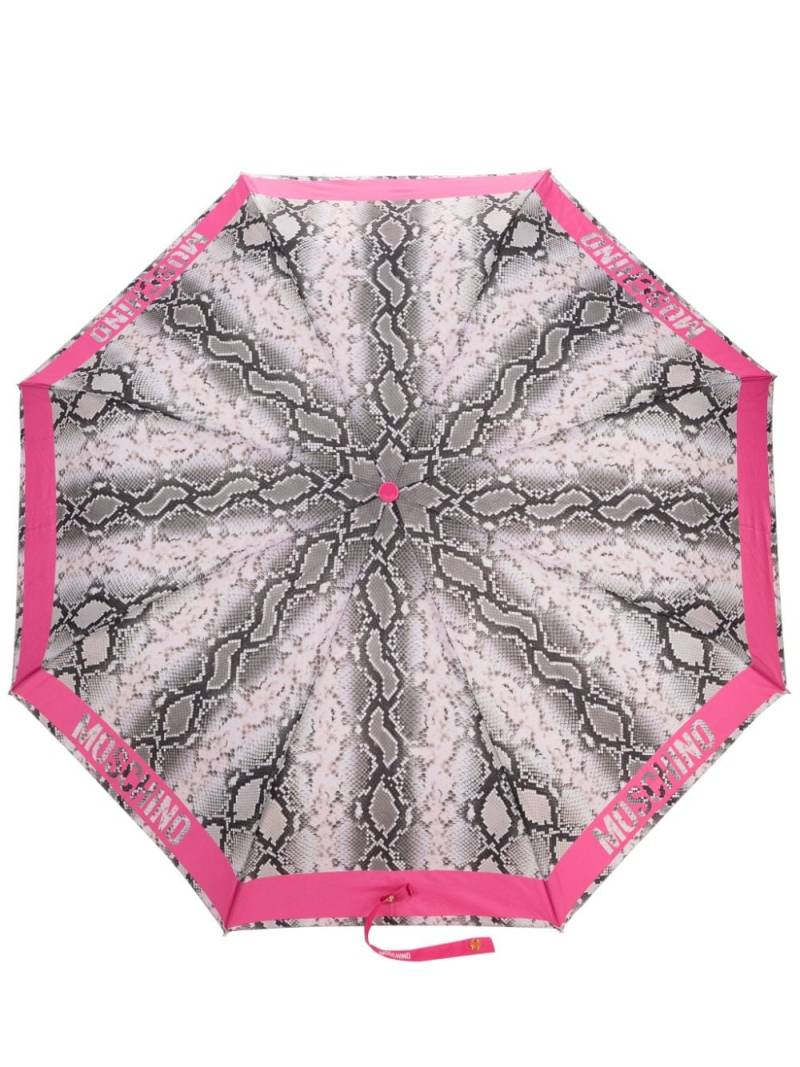 Moschino logo-edge snakeskin-print umbrella - Pink von Moschino