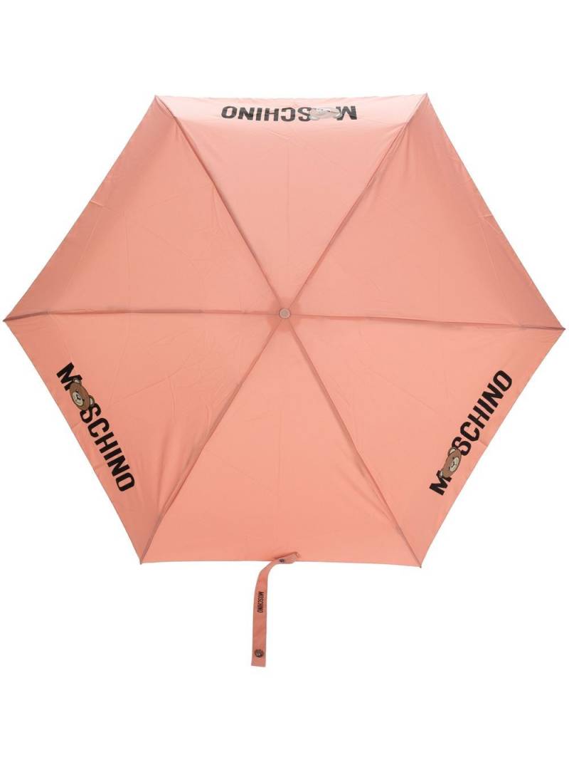 Moschino logo-print six-panel umbrella - Pink von Moschino