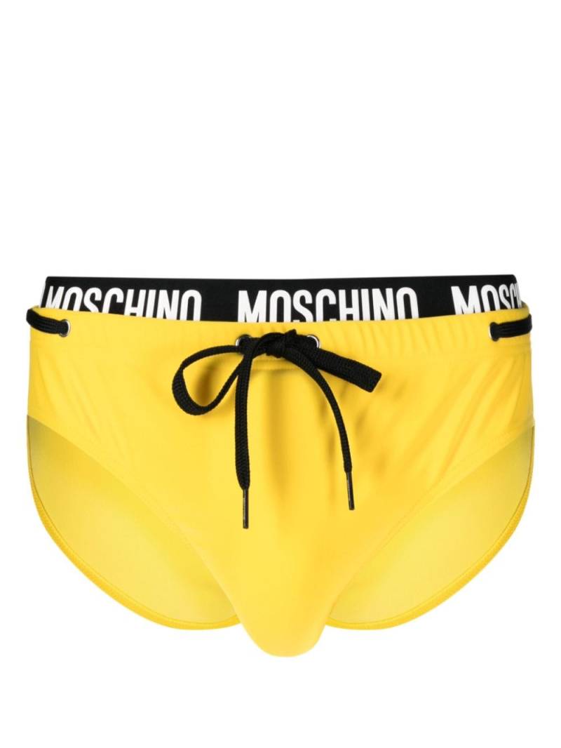 Moschino logo-waistband drawstring swim trunks - Yellow von Moschino