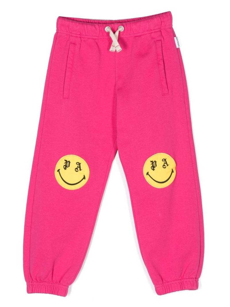 Palm Angels Kids smiley-print track pants - Pink von Palm Angels Kids