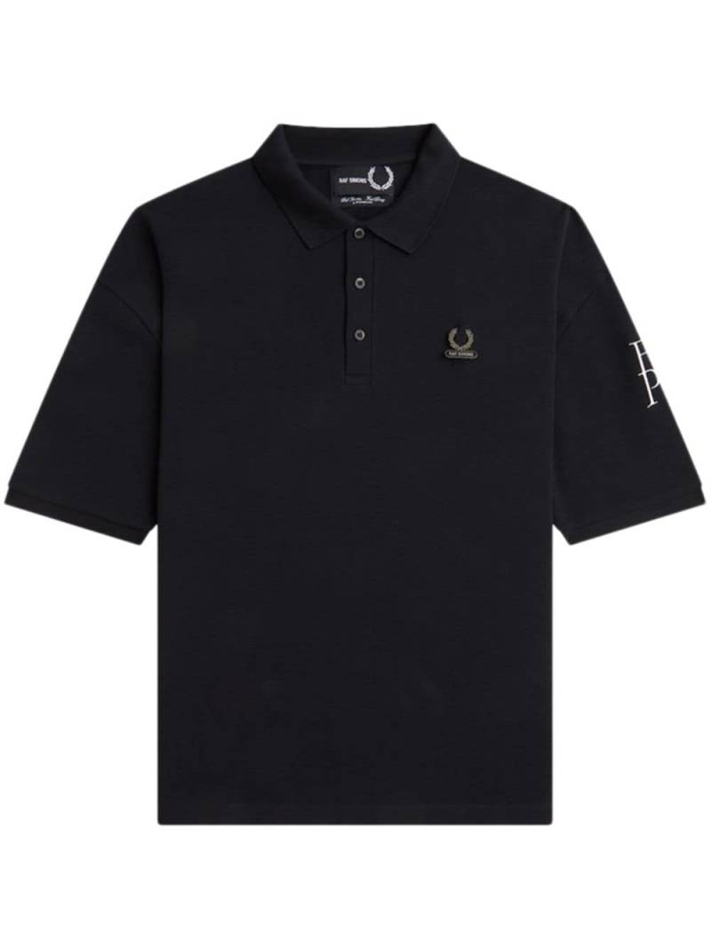 Raf Simons X Fred Perry logo-plaque cotton polo shirt - Black von Raf Simons X Fred Perry