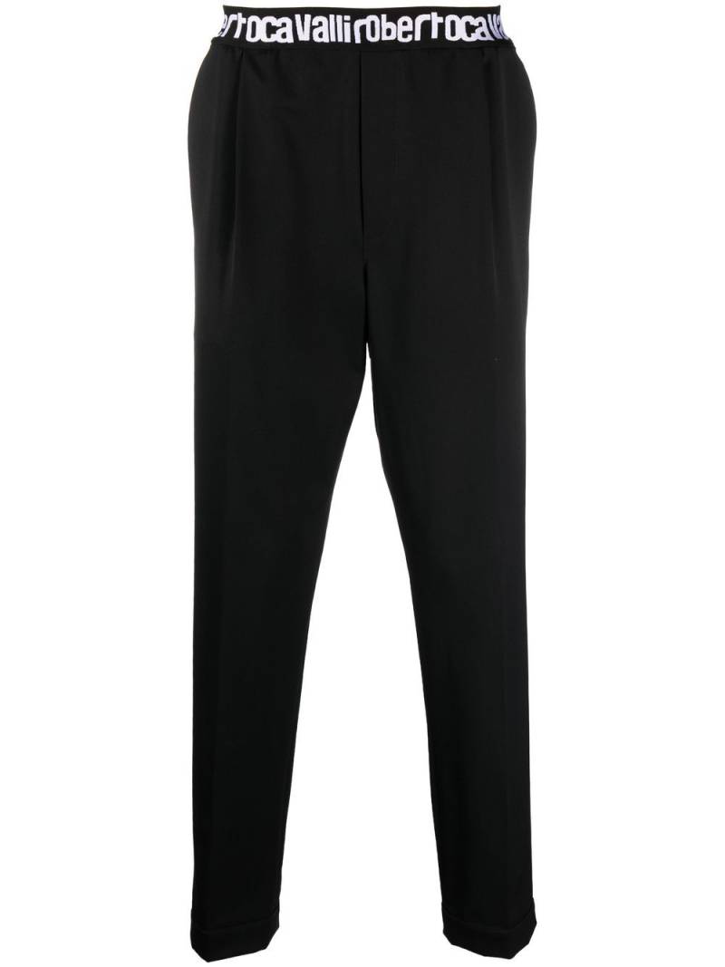 Roberto Cavalli logo-waist tapered trousers - Black von Roberto Cavalli