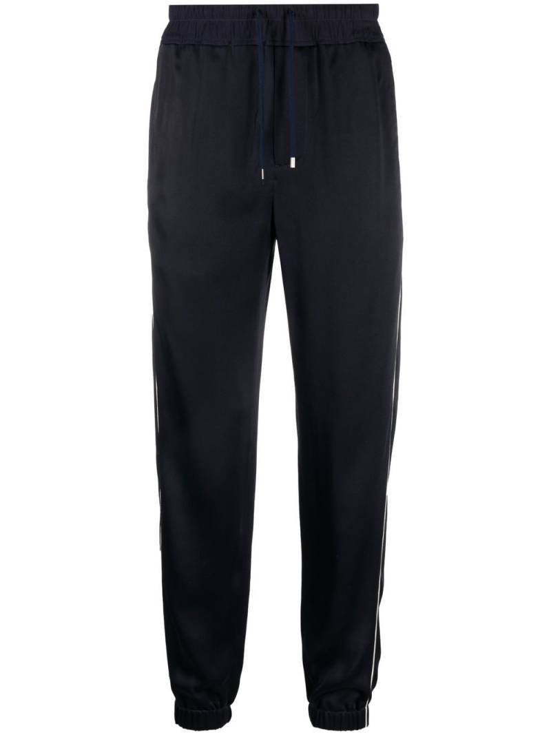 Saint Laurent glossy-finish track pants - Blue von Saint Laurent