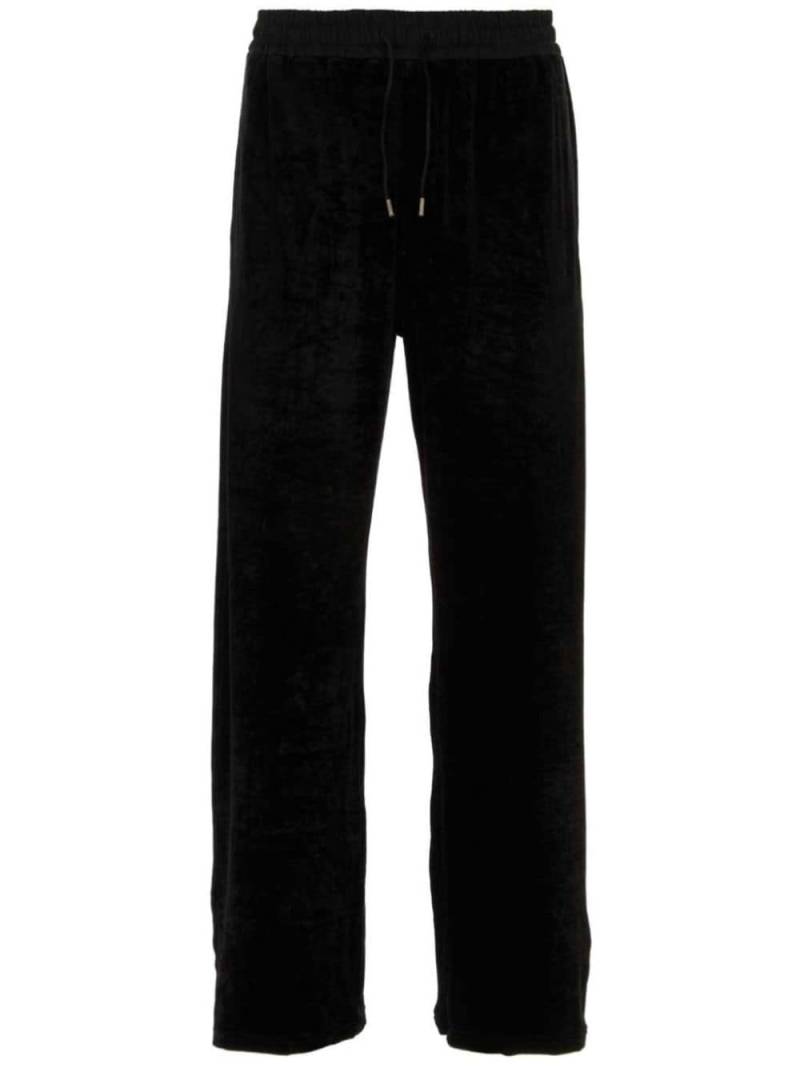 Saint Laurent logo-plaque drawstring track pants - Black von Saint Laurent