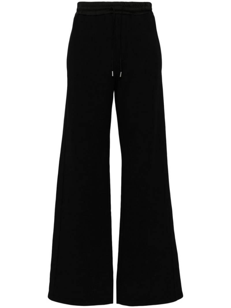 Saint Laurent wide-leg cotton track pants - Black von Saint Laurent