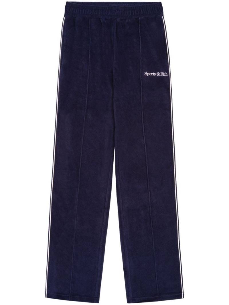 Sporty & Rich New Serif logo-embroidered track pants - Blue von Sporty & Rich