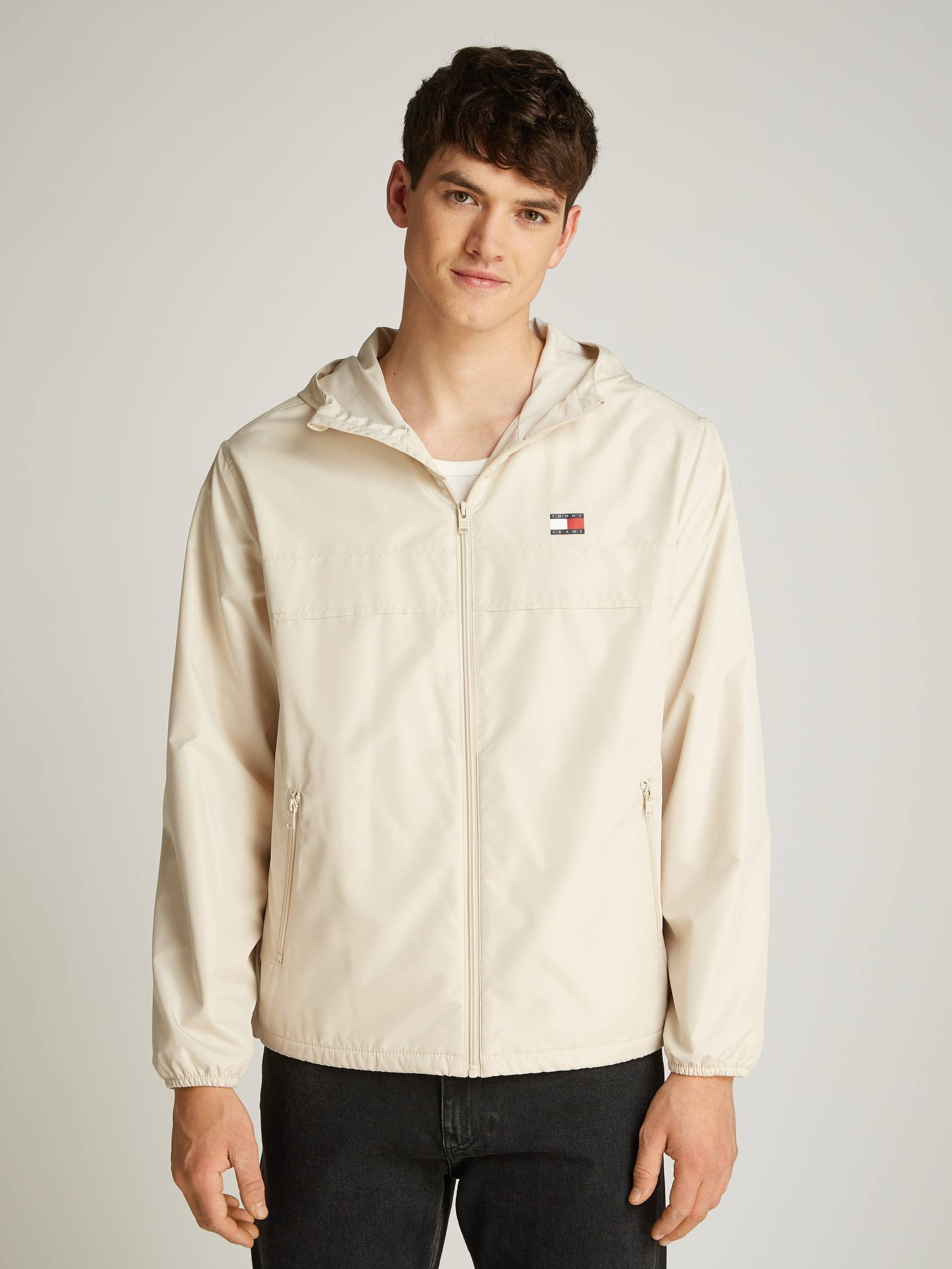 Tommy Jeans Windbreaker »TJM FLEECE LINED CHICAGO JACKET«, mit Kapuze, mit Fleece-Futter von TOMMY JEANS
