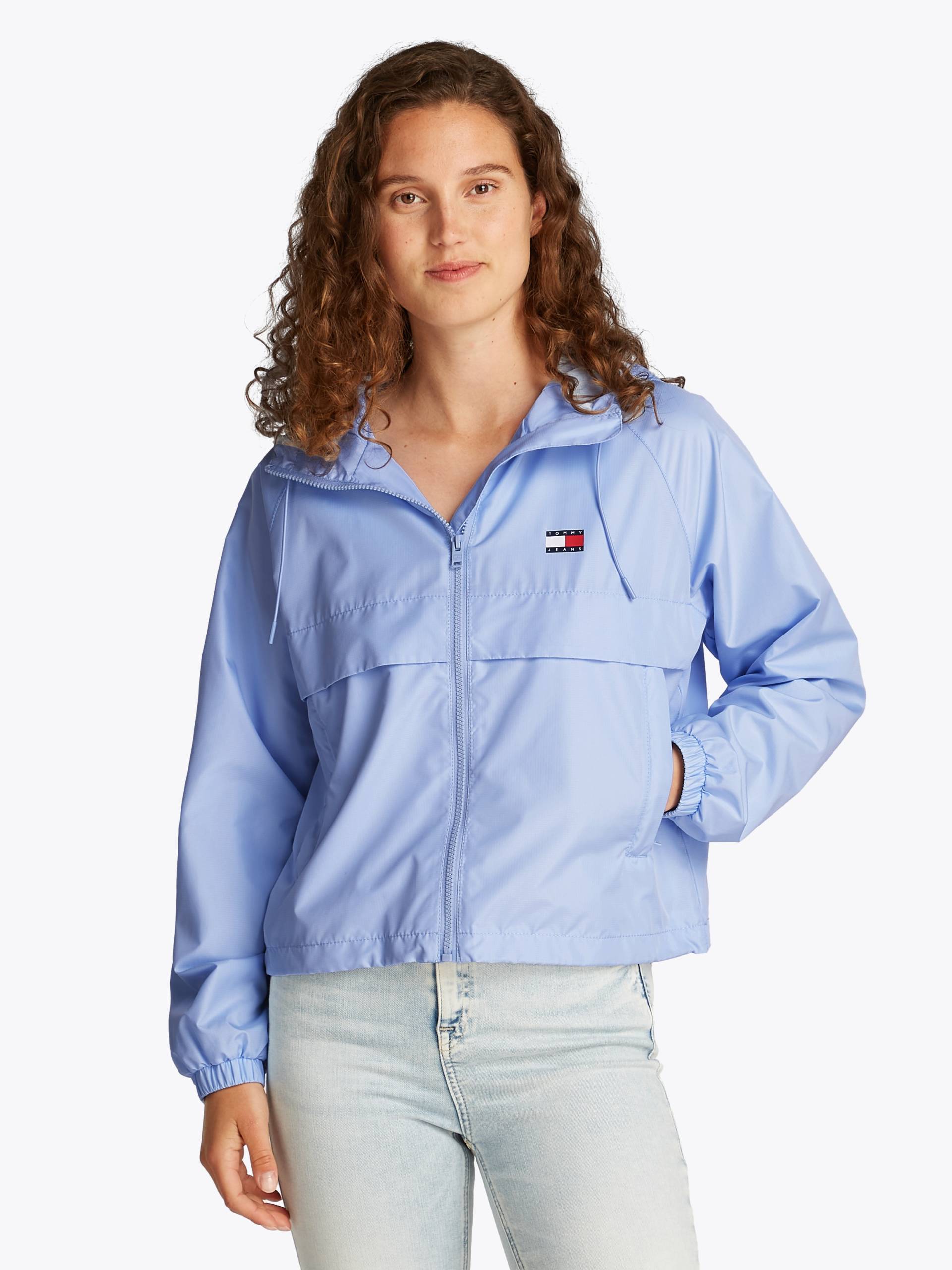 Tommy Jeans Windbreaker »TJW ESSENTIAL WINDBREAKER EXT«, mit Kapuze, mit Logodruck Tommy Jeans Windbreaker »TJW ESSENTIAL WINDBREAKER EXT«, mit Kapuze, mit Logodruck von TOMMY JEANS