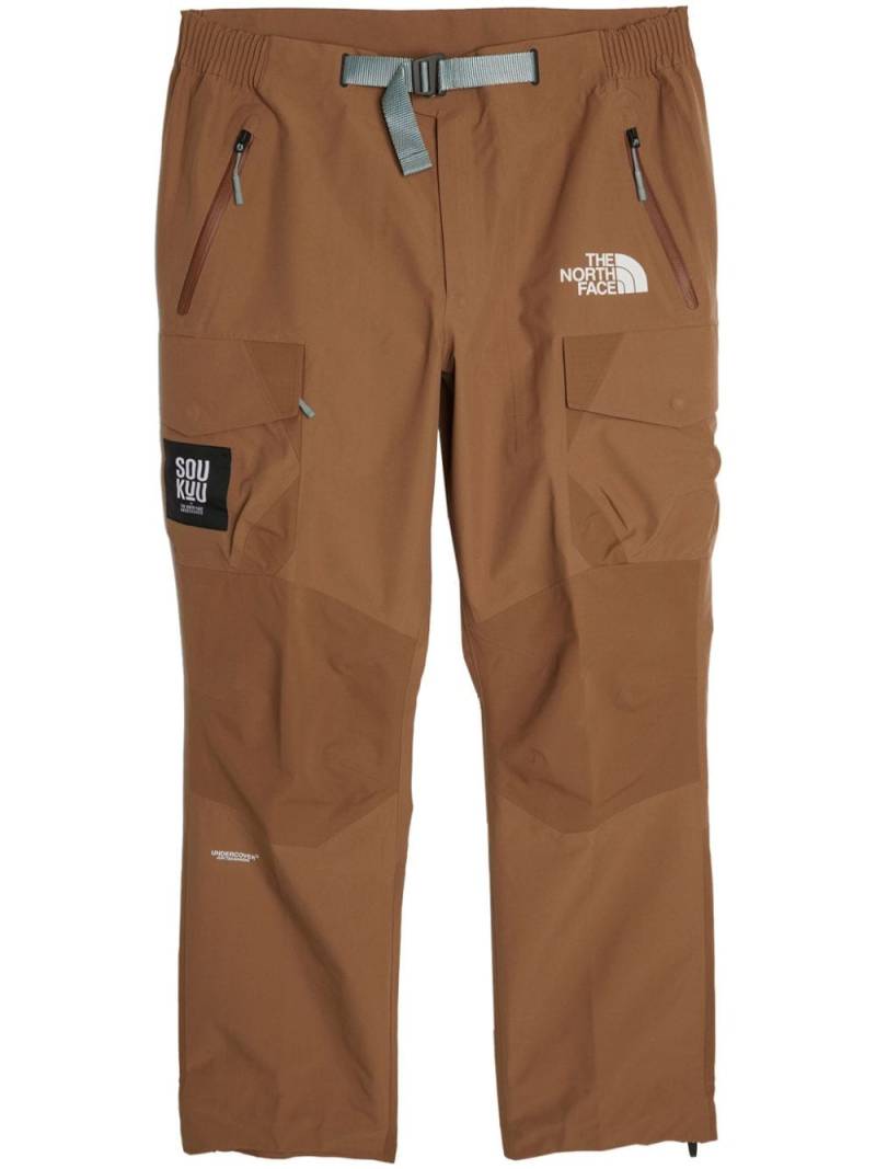 The North Face x Undercover Soukuu belted straight-leg trousers - Brown von The North Face