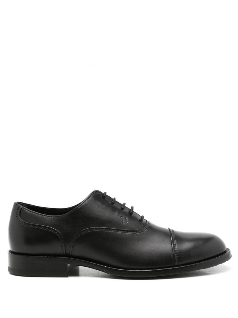 Tod's monogram-stamp oxford shoes - Black von Tod's