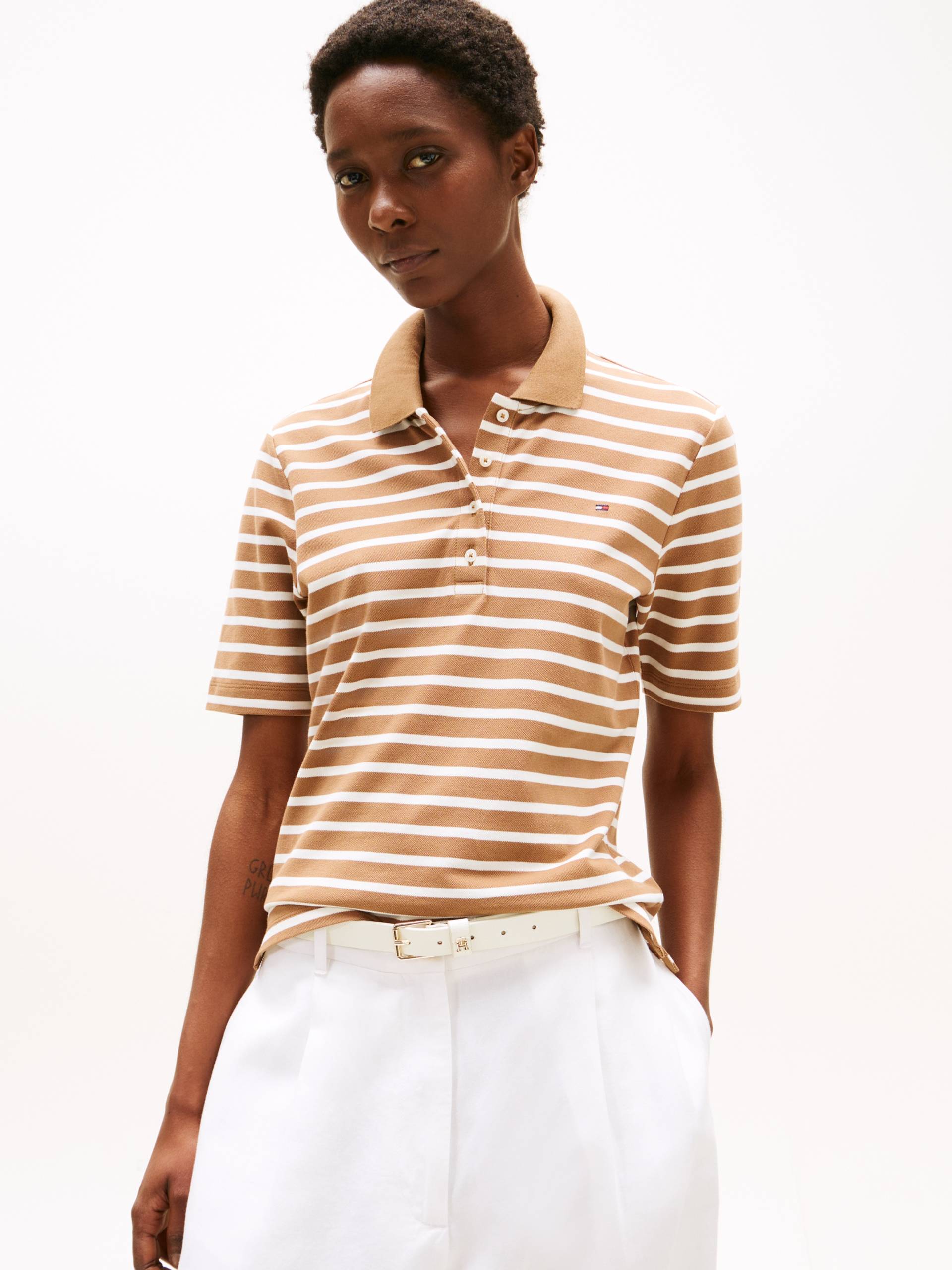 Tommy Hilfiger Poloshirt »1985 Regular Fit Pique Premium Polo«, mit Logo-Stickerei, mit Seitenschlitzen Tommy Hilfiger Poloshirt »1985 Regular Fit Pique Premium Polo«, mit Logo-Stickerei, mit Seitenschlitzen von Tommy Hilfiger