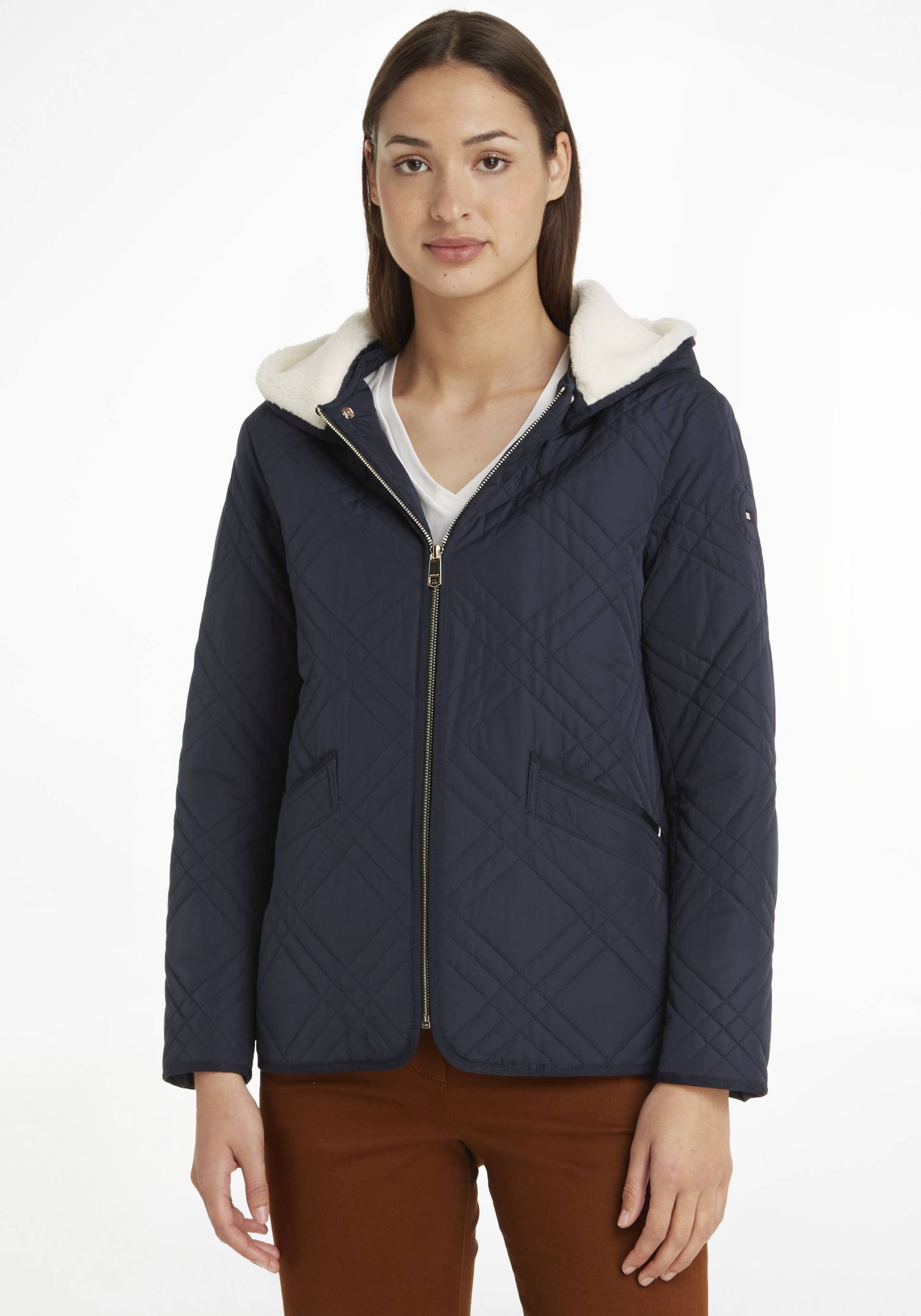 Tommy Hilfiger Steppjacke, mit Kapuze, mit Markenlabel Tommy Hilfiger Steppjacke, mit Kapuze, mit Markenlabel von Tommy Hilfiger