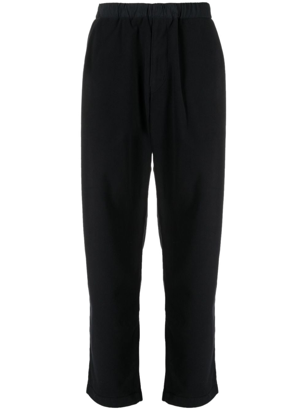 Undercover elasticated-waist tapered trousers - Black von Undercover