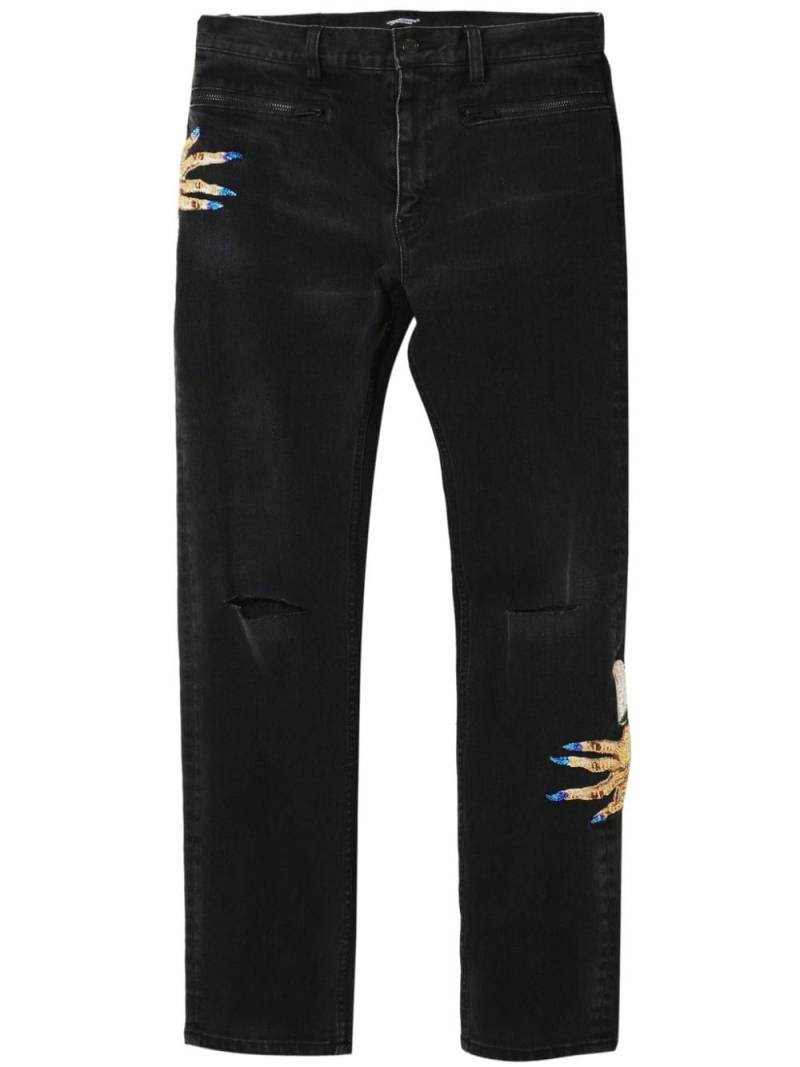 Undercover motif-embroidered straight-leg jeans - Black von Undercover