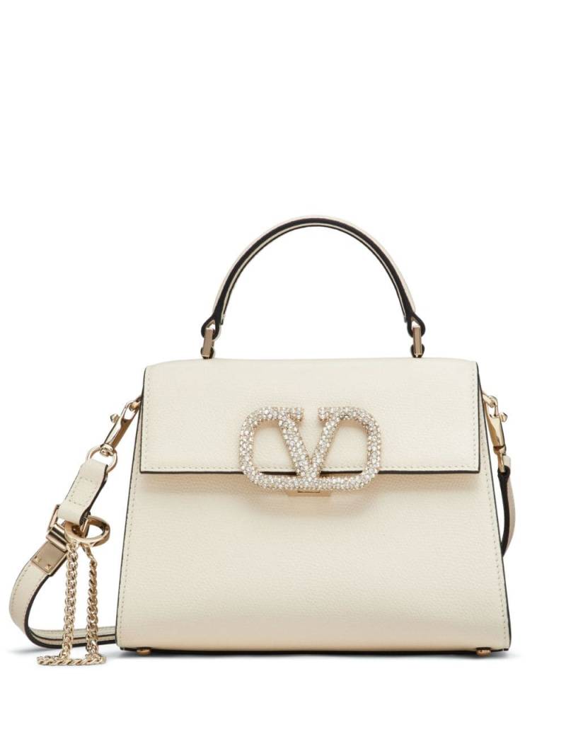 Valentino Garavani small VSling embellished handbag - Neutrals von Valentino Garavani