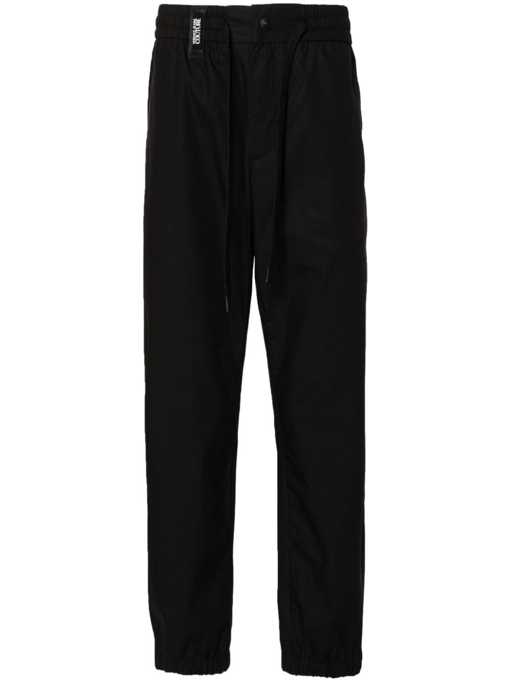 Versace Jeans Couture logo-strap tapered-leg trousers - Black von Versace Jeans Couture