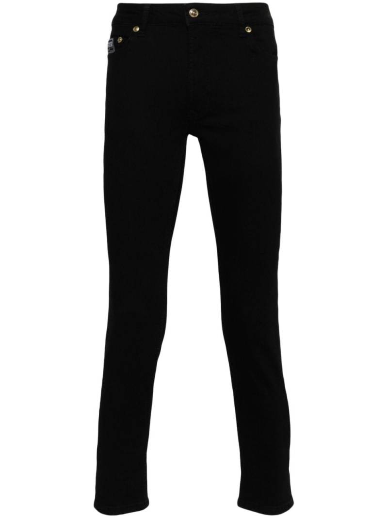 Versace Jeans Couture low-rise skinny jeans - Black von Versace Jeans Couture
