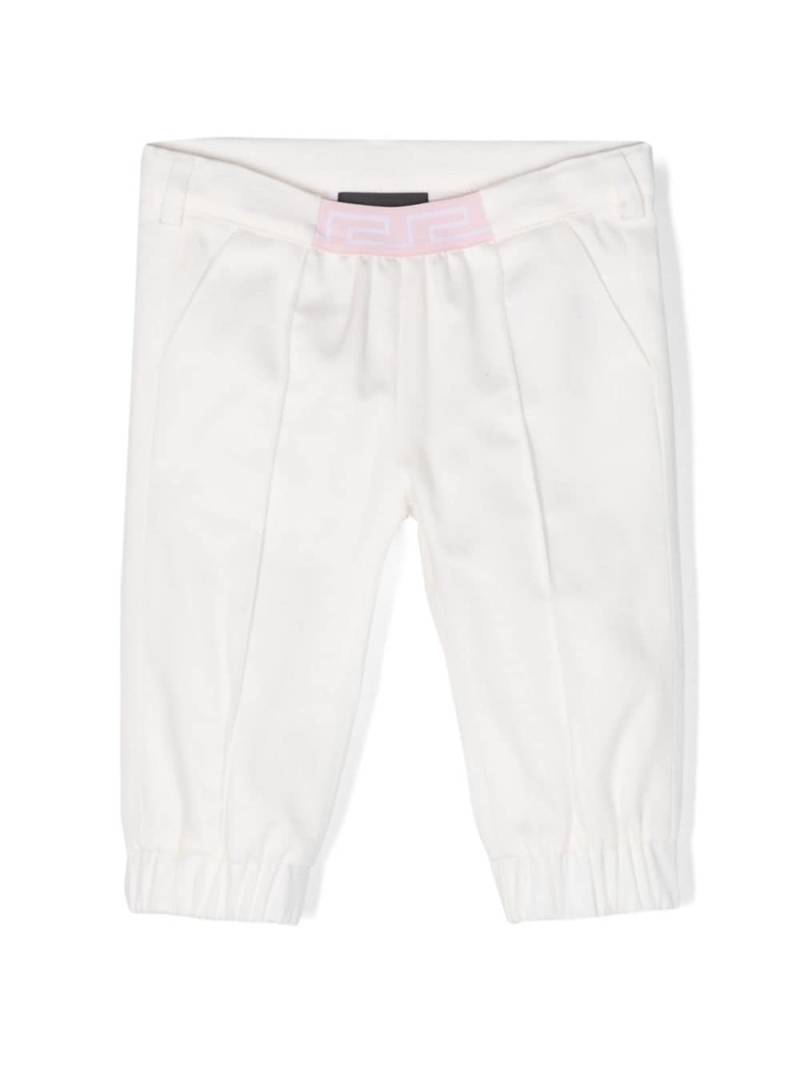 Versace Kids Greca-waistband tapered trousers - White von Versace Kids
