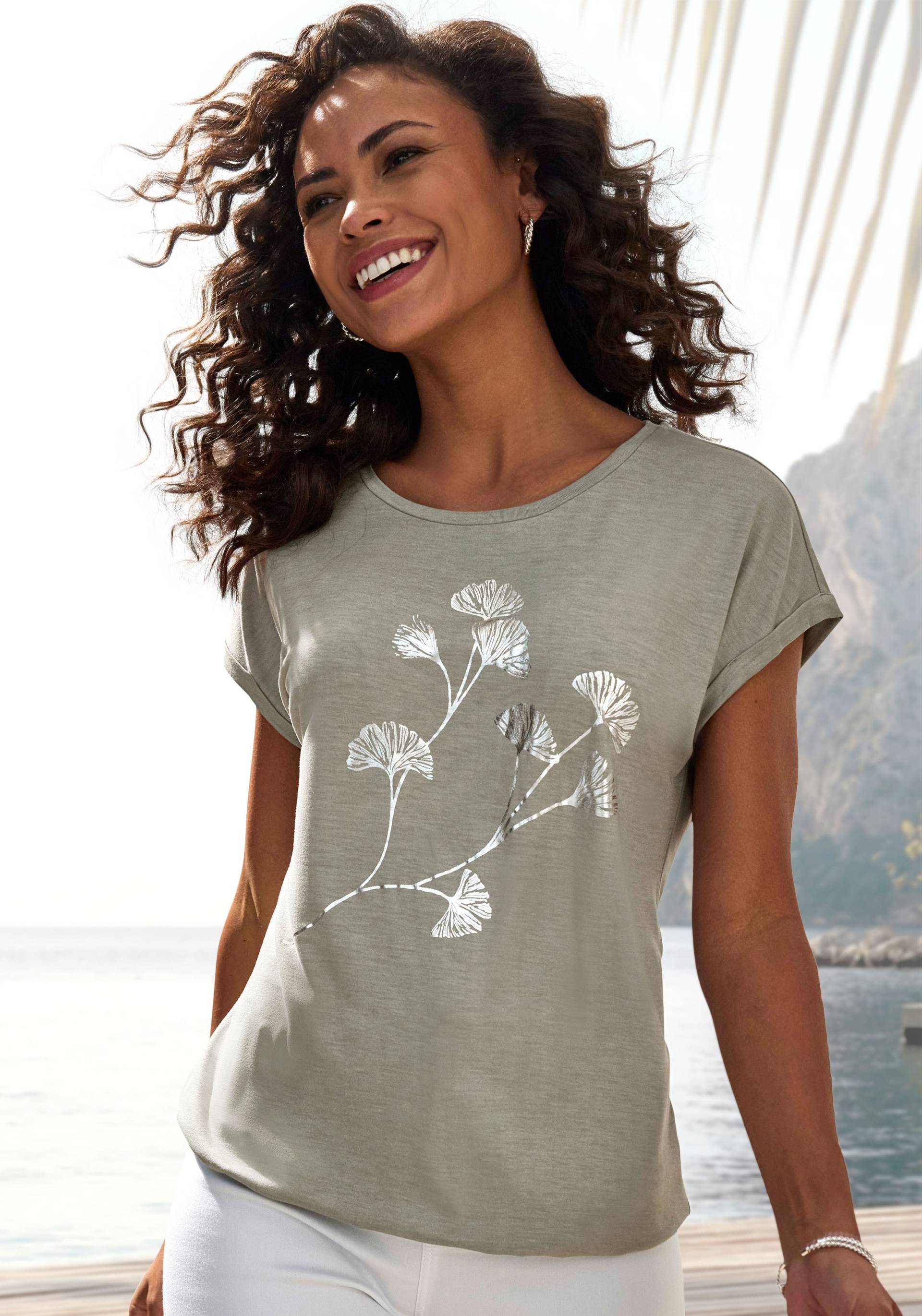 Vivance Kurzarmshirt »mit schimmerndem Blumenprint«, aus elastischer Viskose-Qualität Vivance Kurzarmshirt »mit schimmerndem Blumenprint«, aus elastischer Viskose-Qualität von Vivance