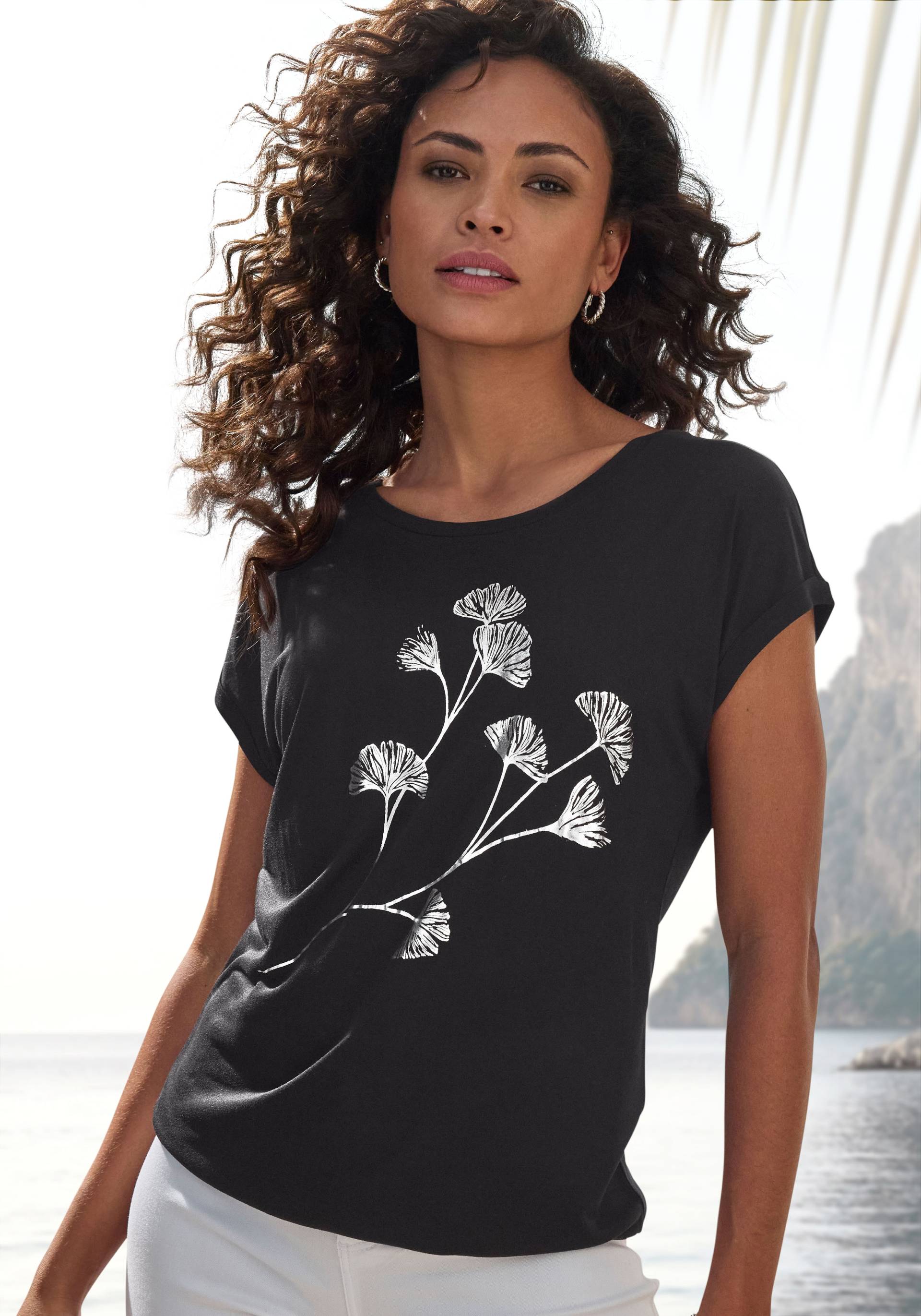 Vivance Kurzarmshirt »mit schimmerndem Blumenprint«, aus elastischer Viskose-Qualität Vivance Kurzarmshirt »mit schimmerndem Blumenprint«, aus elastischer Viskose-Qualität von Vivance