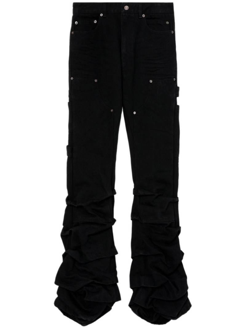 We11done Wave low-rise flared jeans - Black von We11done