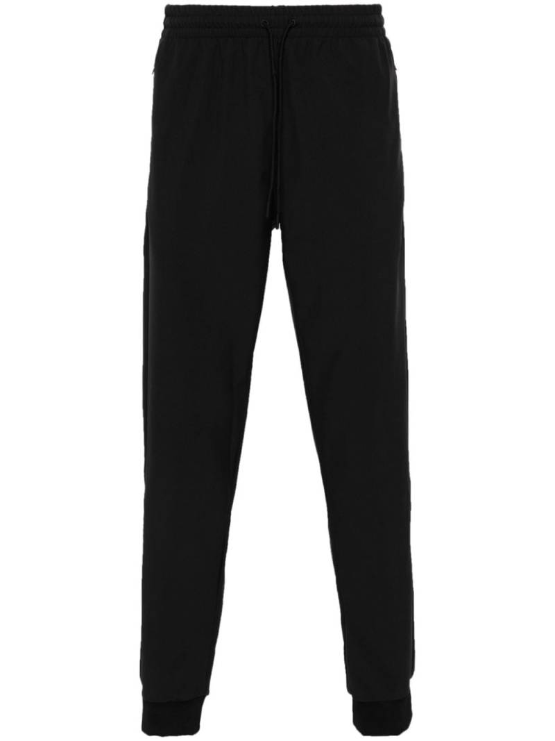 adidas SST 3-Stripes track pants - Black von adidas