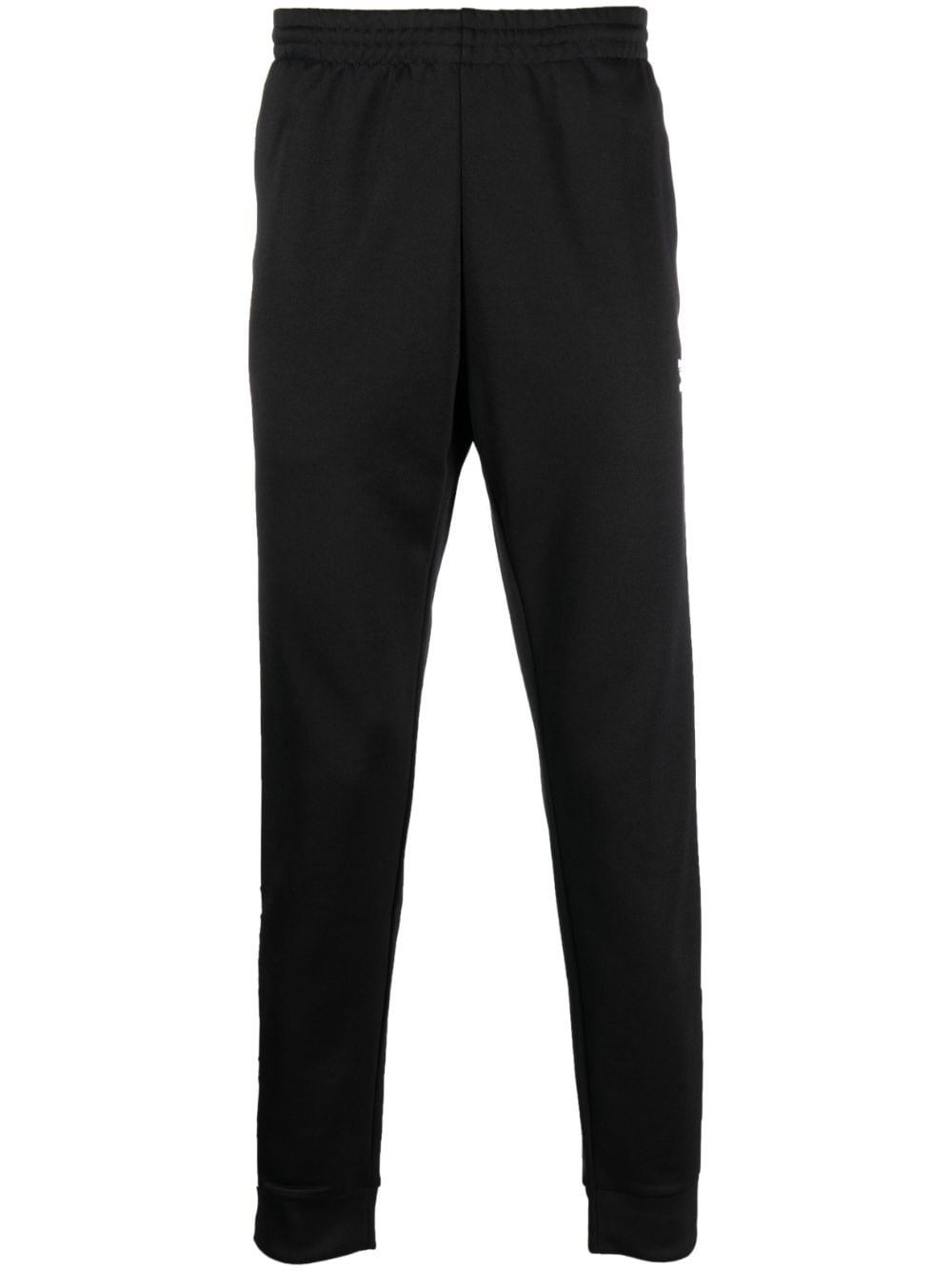 adidas embroidered-logo tapered track pants - Black von adidas