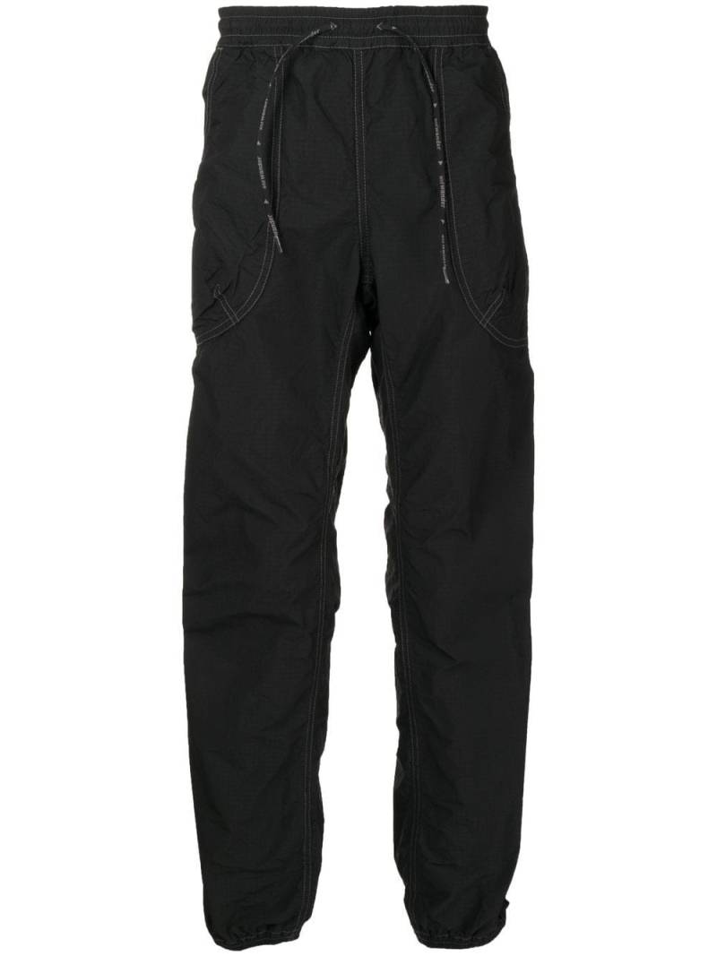 and Wander contrast-stitch track pants - Black von and Wander