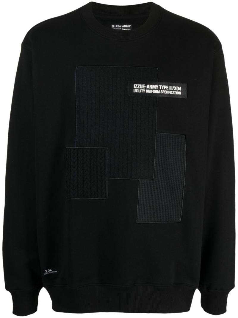 izzue logo-appliqué patchwork sweatshirt - Black von izzue