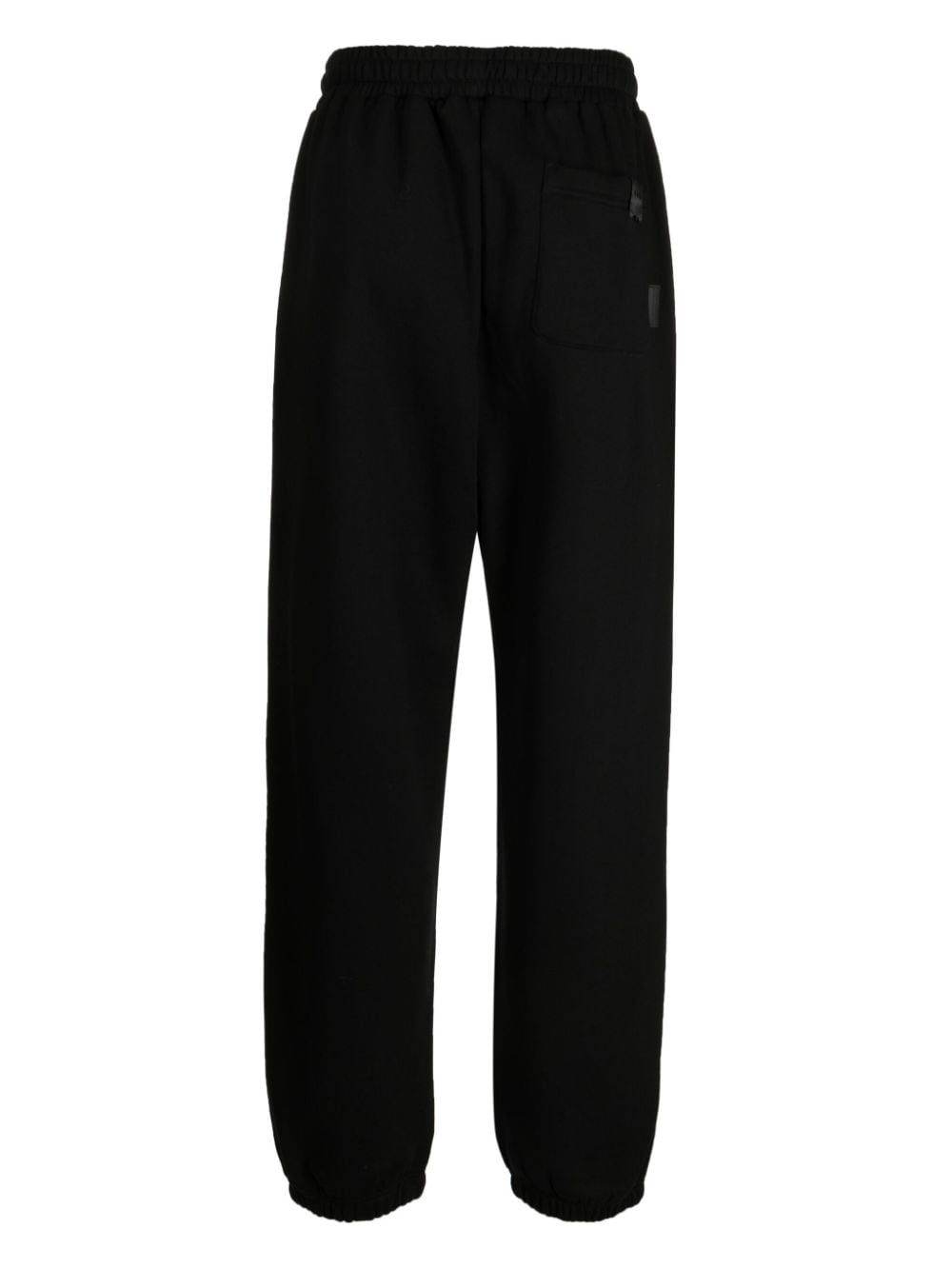 izzue logo-embroidered slip-on track pants - Black von izzue