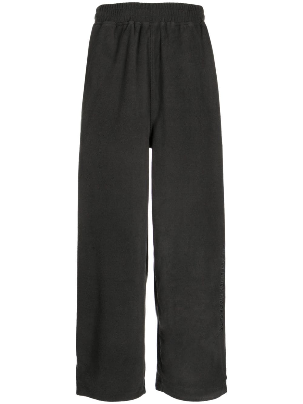 izzue logo-patch straight trousers - Grey von izzue